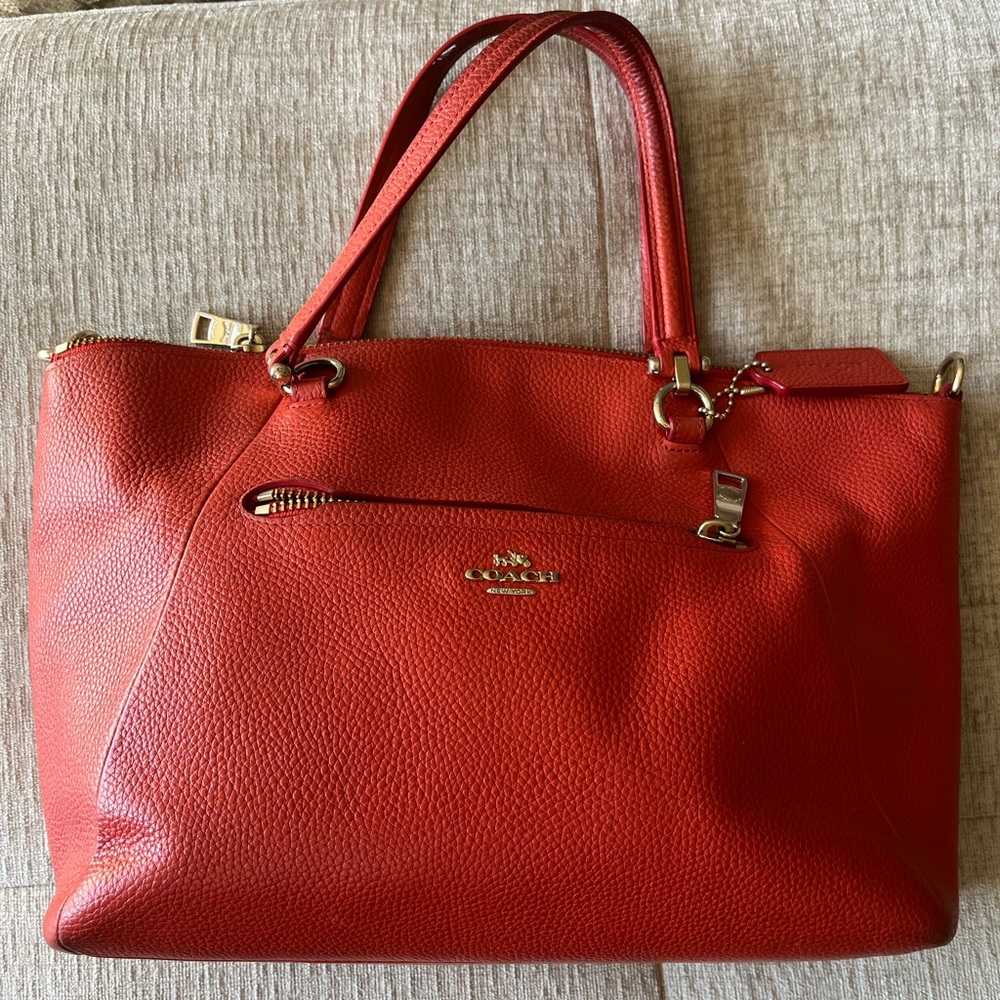 Coach Leather handbag with beautiful gold zipper and hardware.
